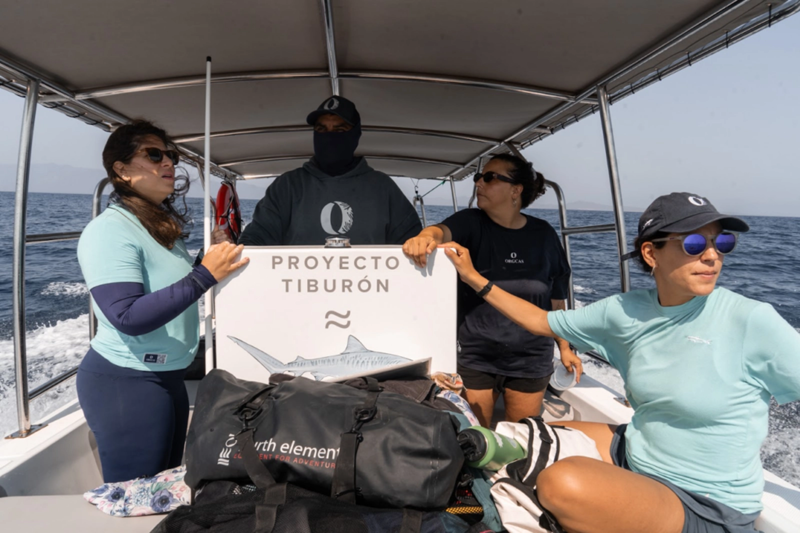 Members of the Orgcas team searching for wildlife. Photo Credit: Marla Tomorug