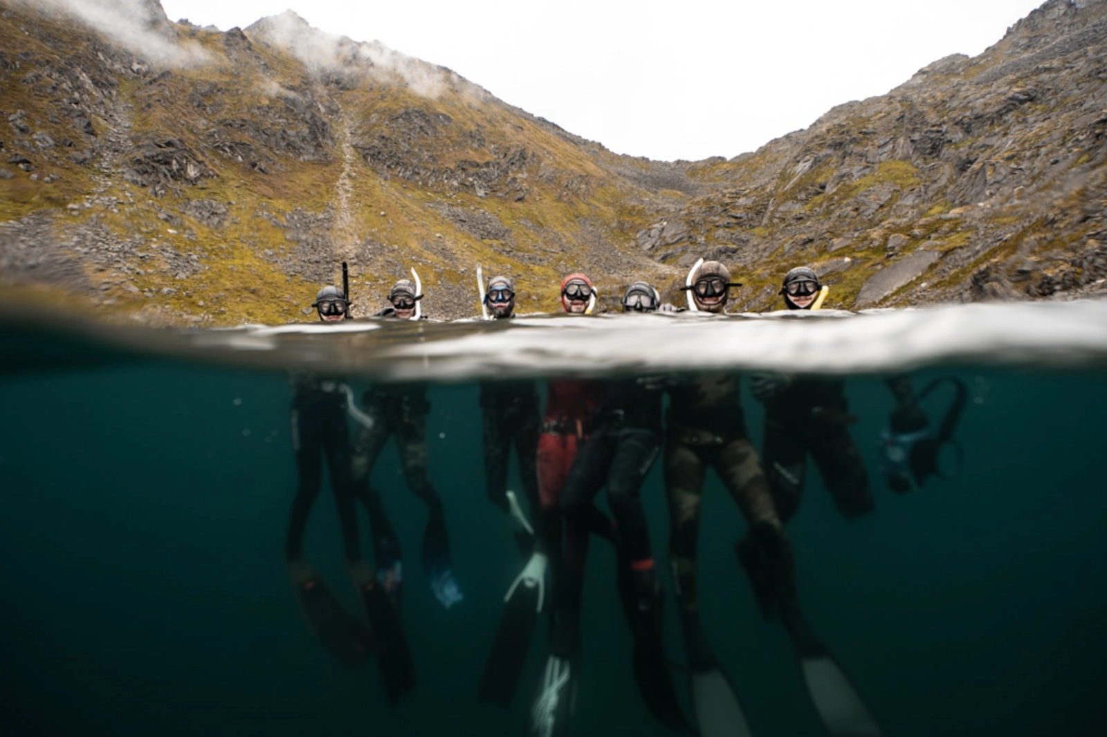 JD leading a group of Alaskans during an alpine lake freediving event. Photo Credit: Adam Moore