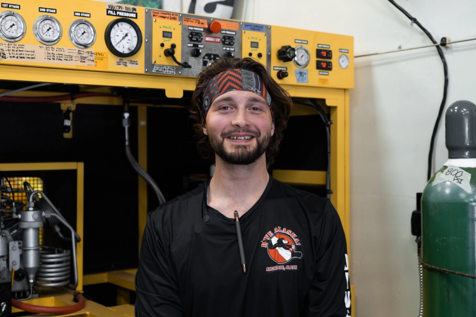 Working at Dive Alaska, JD plays many roles with a focus on community building. Photo Credit: Marla Tomorug